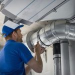 hvac_worker_install_ducted_pipe_system_for_ventilation_and_air_conditioning._copy_space